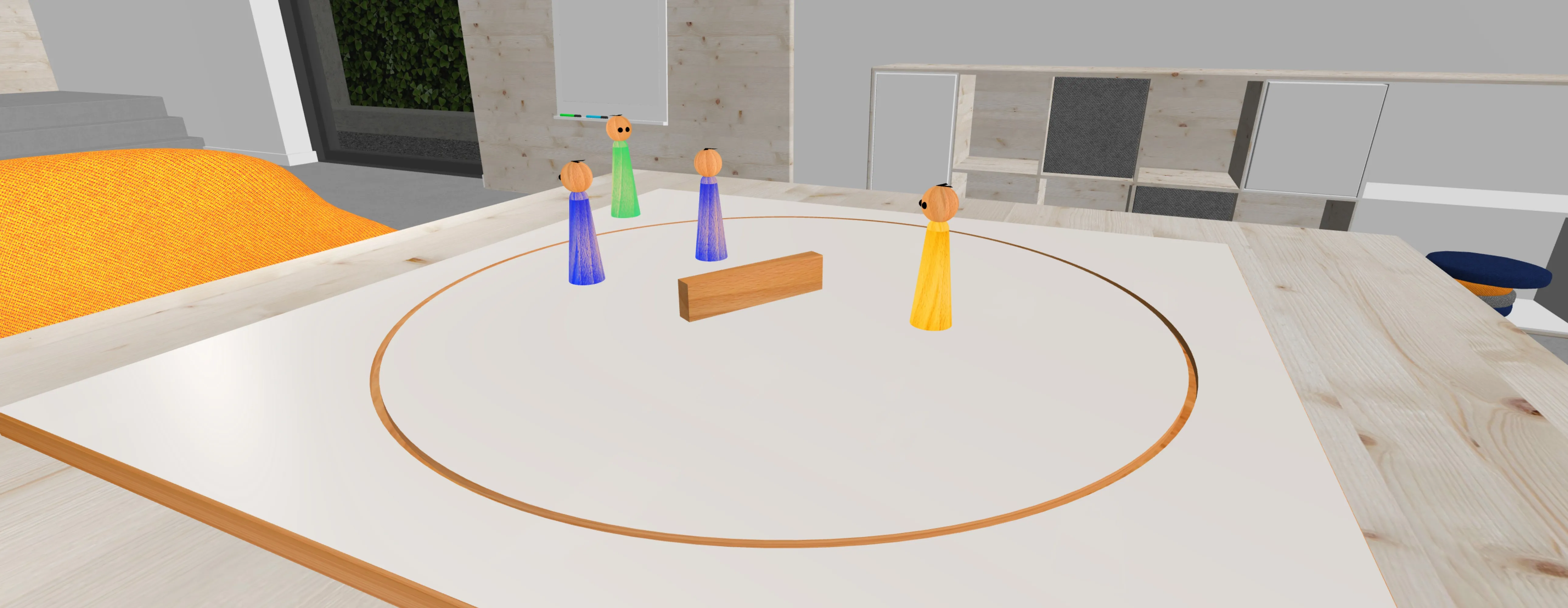 Tablero sistémico online con cuatro figuras de madera de colores y un listón de madera en la sala de coaching virtual